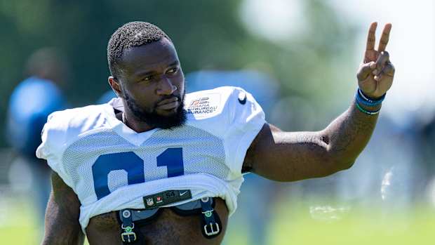 Indianapolis Colts defensive end Yannick Ngakoue (91) signals to fans during training camp Wednesday, Aug. 17, 2022, at Grand Park in Westfield, Ind.